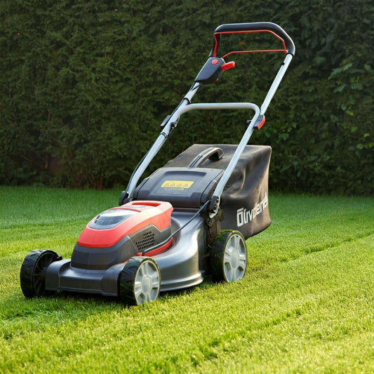 a push lawn mower on the green lawn